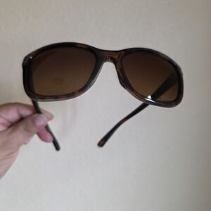 Oakley Brown Wraparound Glasses with Sporty Design